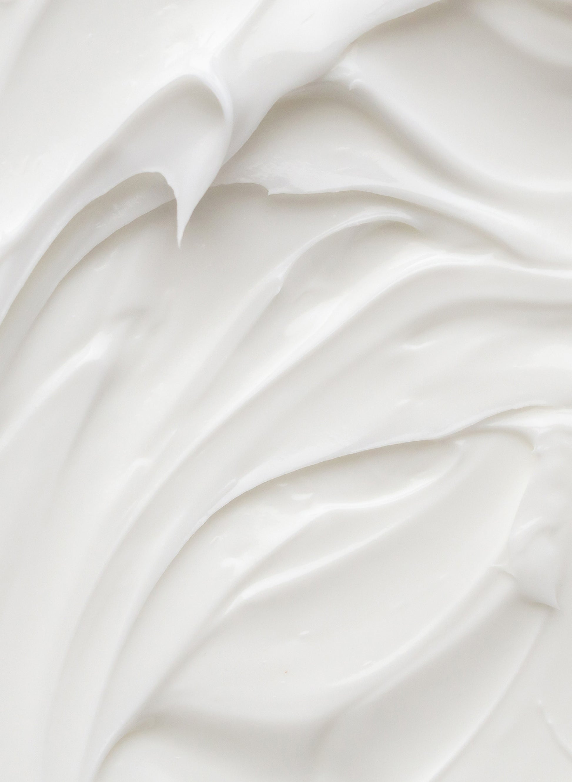 Close up of white lotion in peaks.