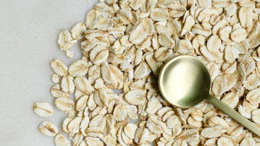 Oats scattered over a white background.